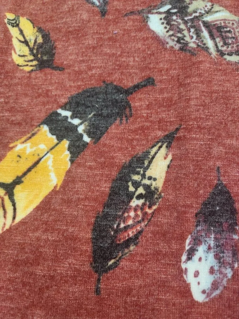 2+ yards Hacci Knit Fabric Reddish-Rust with Feathers ... Beautiful!